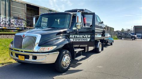 Retriever towing - A tow truck leaves the Northwest Portland impound lot of Retriever Towing, the largest of Portland's "patrol towing" companies. Drivers are typically paid by commission, a system that essentially ...